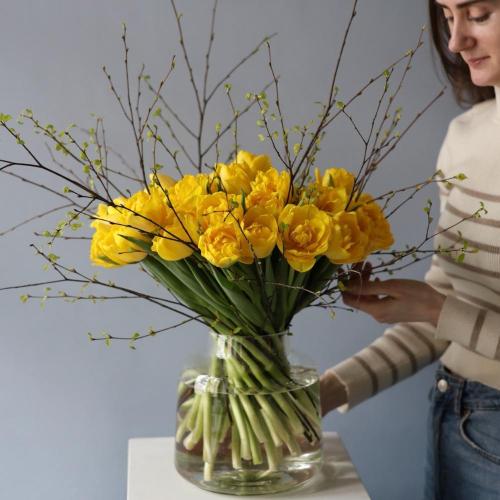 A bouquet of tulips and spring branches in a vase -  Размер S