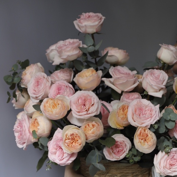 Garden roses of different sorts in a basket