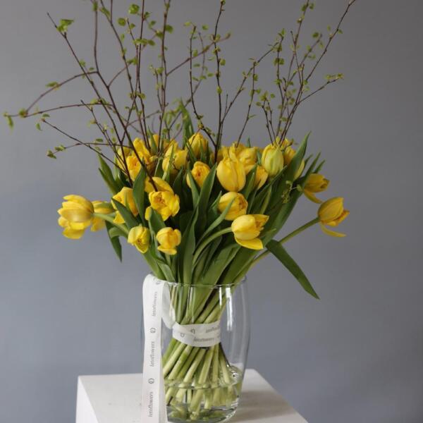 A bouquet of tulips and spring branches in a vase - Размер S