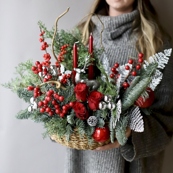 “New Year basket with decor and flowers”