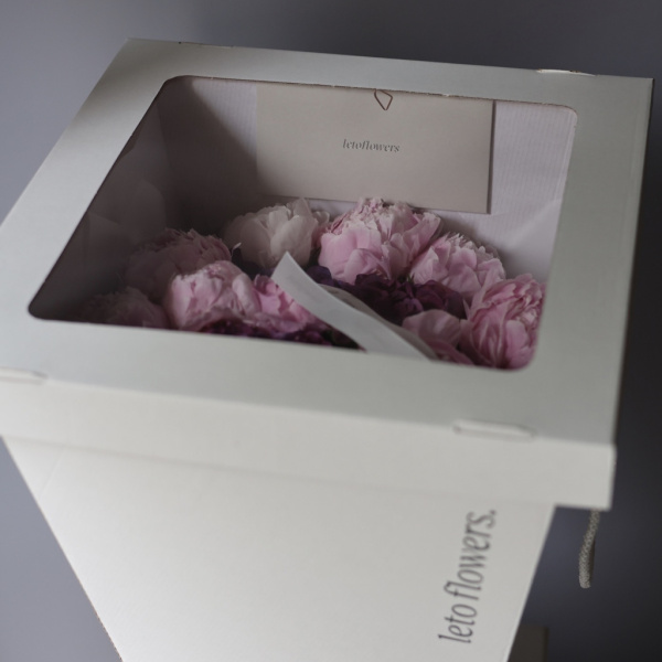 The bouquet is in a protective box